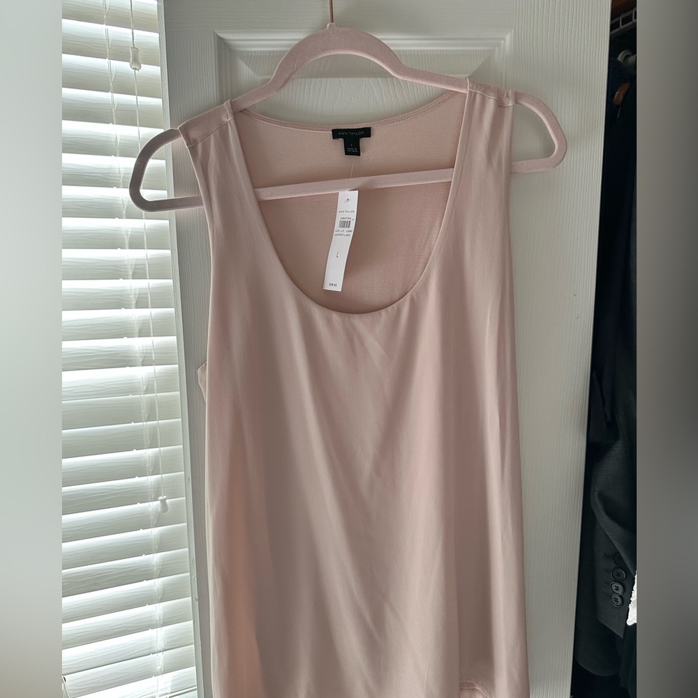Pink Sleeveless top.